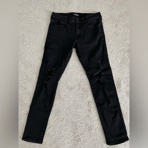 Men’s black distressed skinny jeans